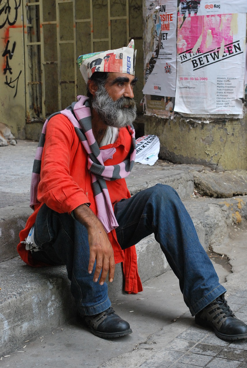 man sitting hat free photo