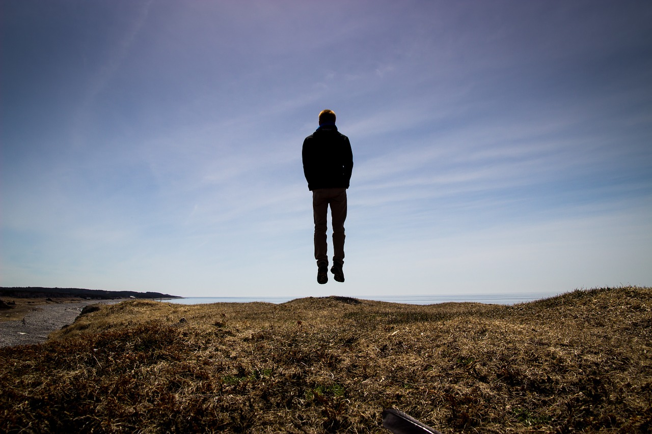 man jumping silhouette free photo