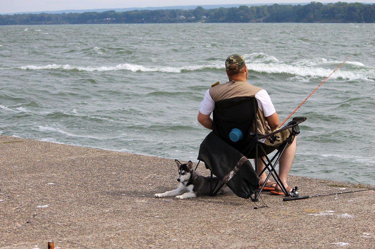 man dog fish free photo