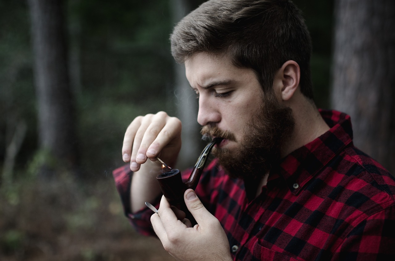 man smoking pipe free photo