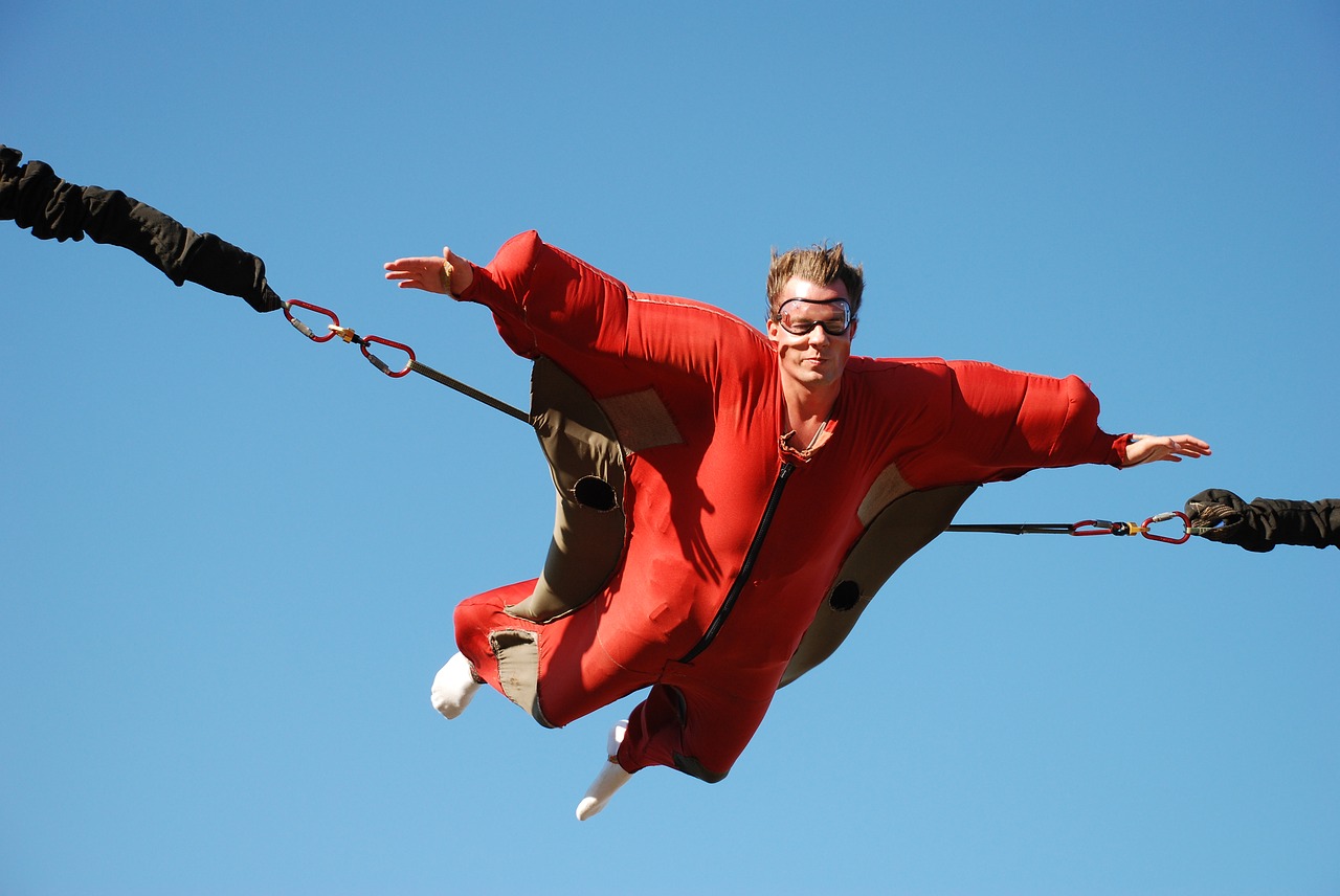 man flying manege show free photo