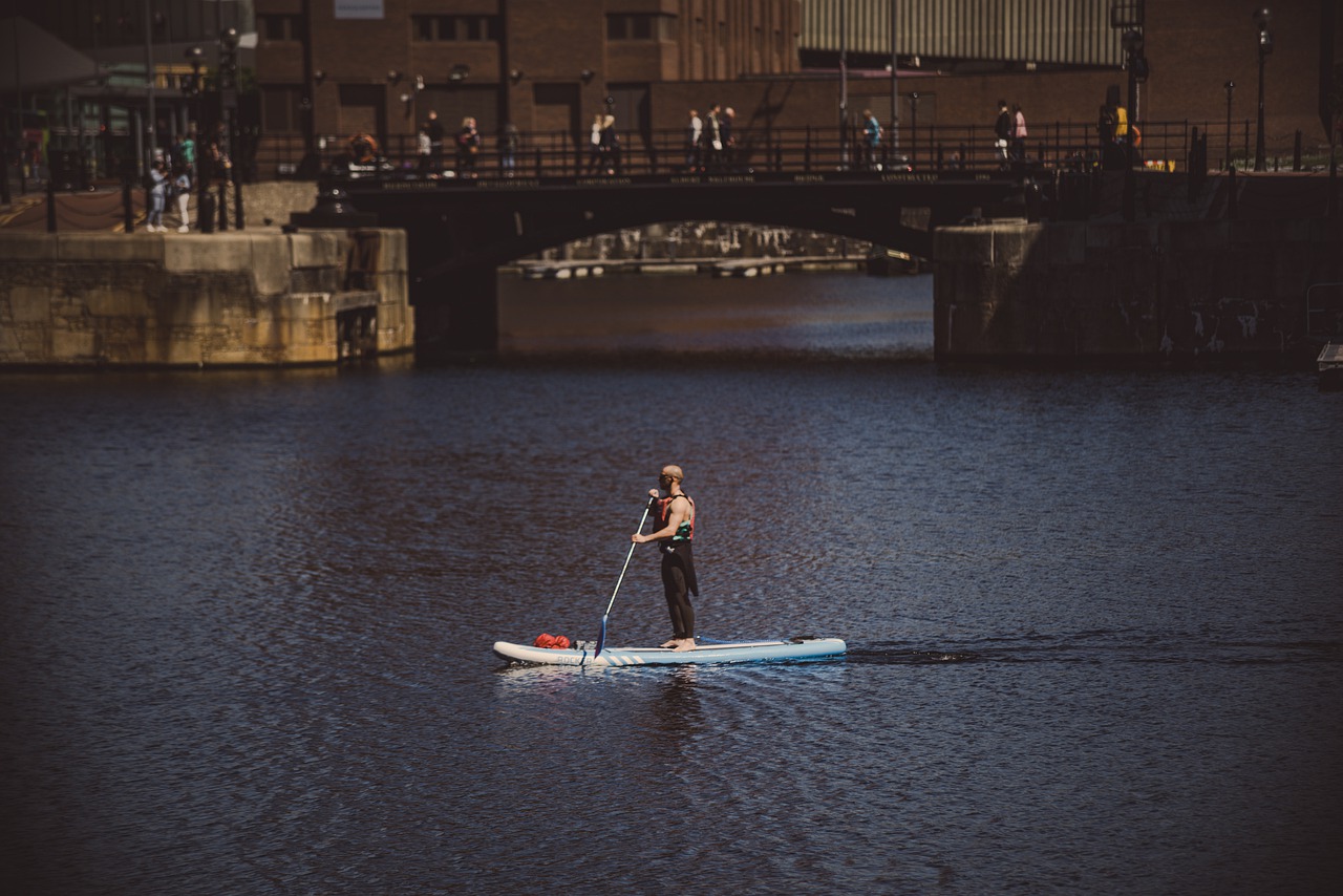 man kayaking in albert docks  liverpool  england free photo
