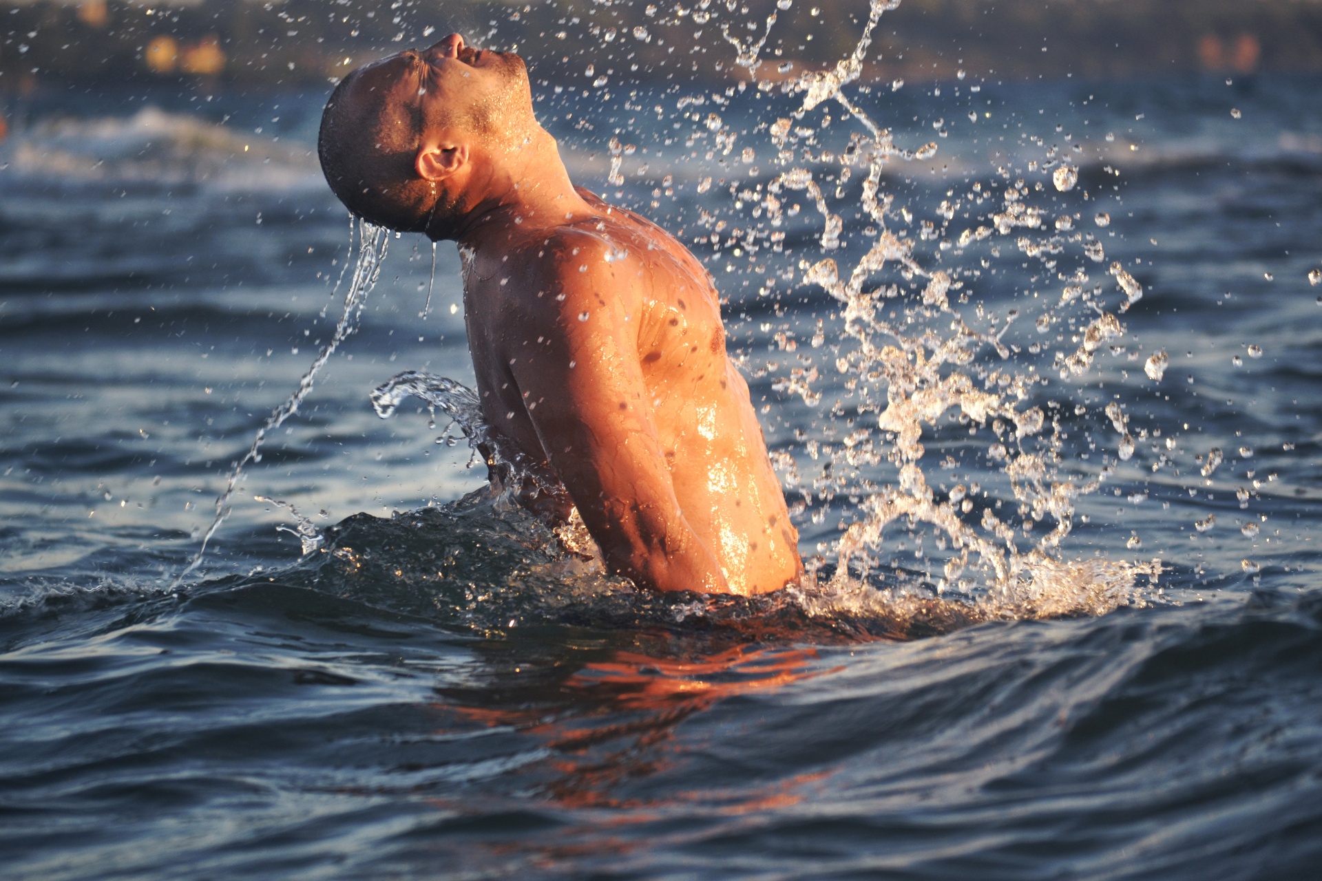 man waves water free photo
