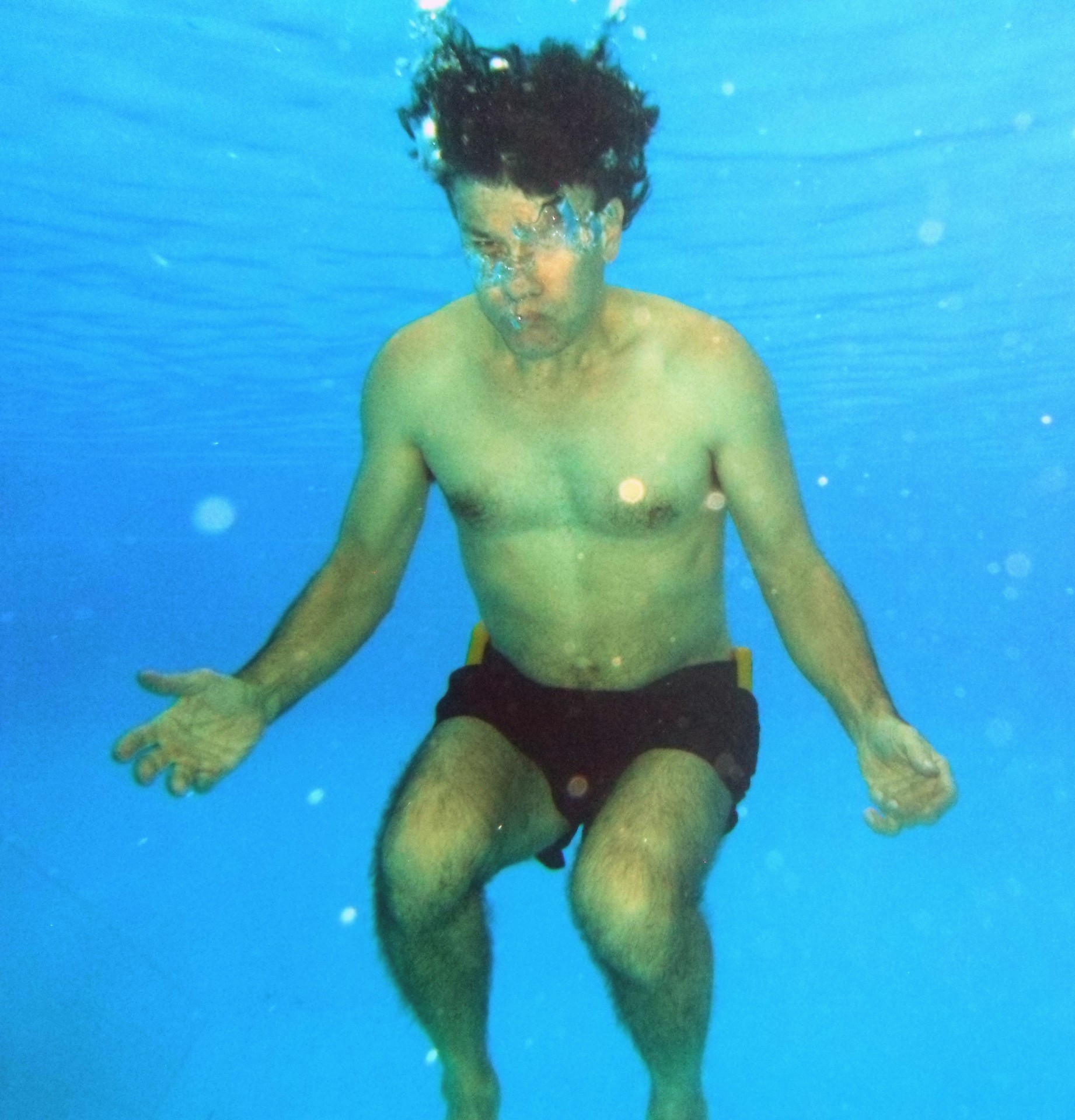 person floating underwater