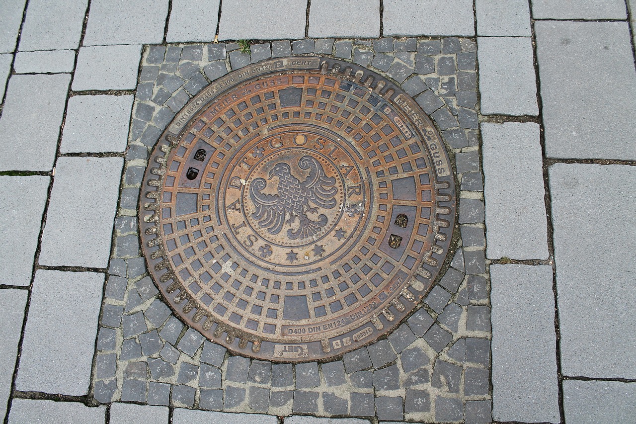 manhole cover  road  goslar free photo