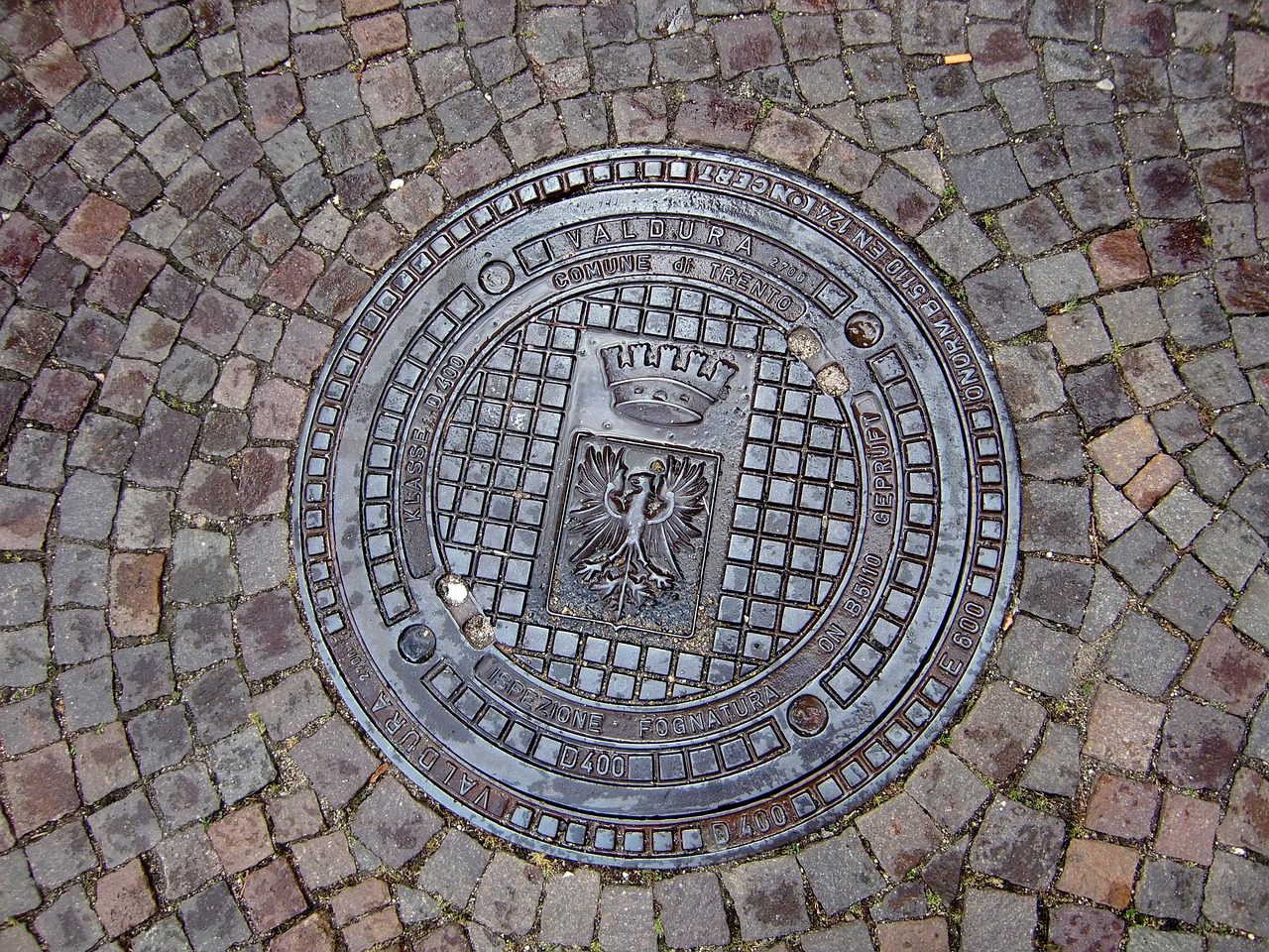 manhole covers blanket coat of arms free photo