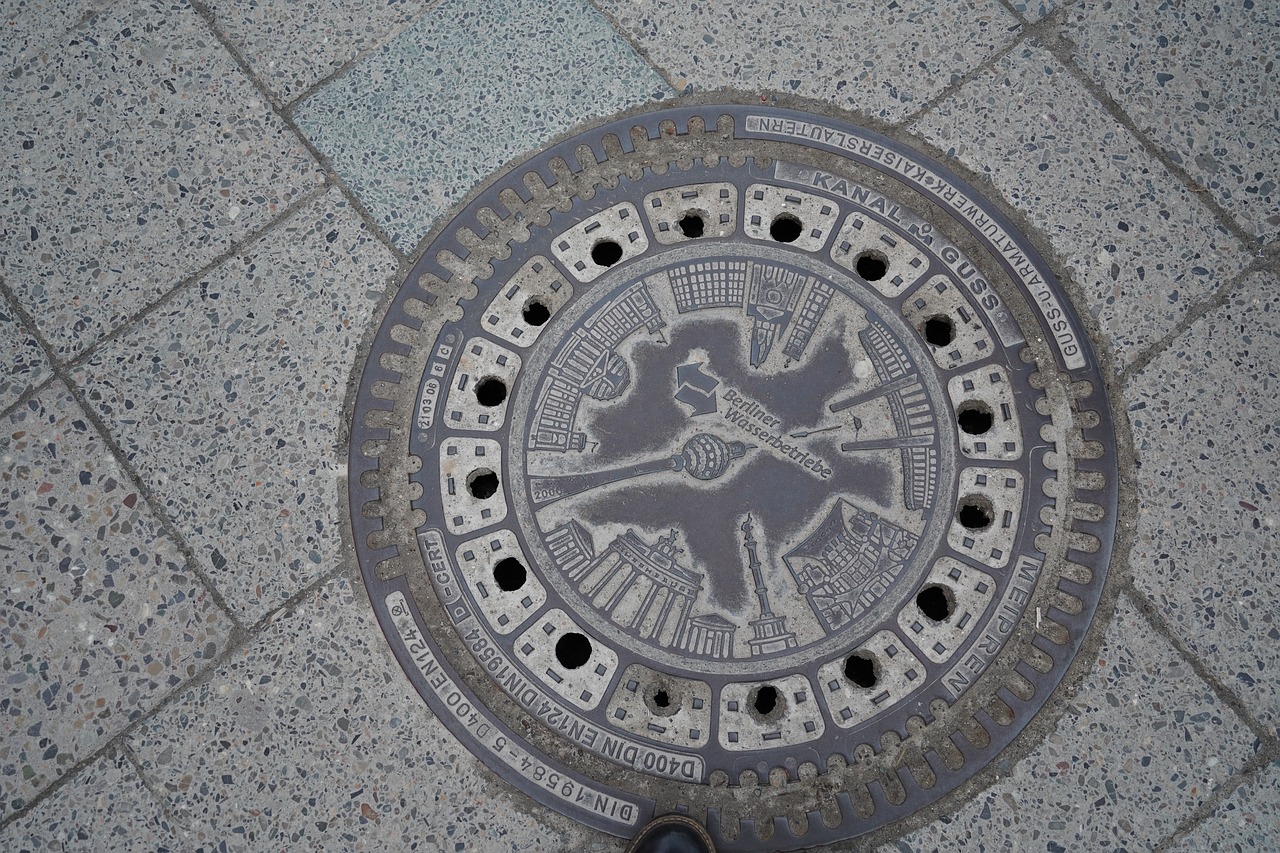 manhole covers  berlin  landmark free photo