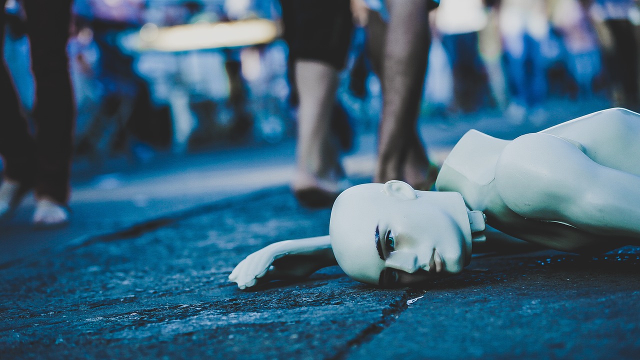 mannequin lying down street free photo