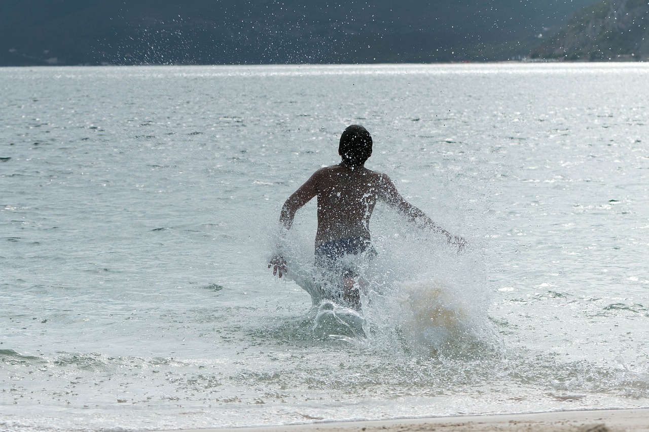 mar child playing beach free photo