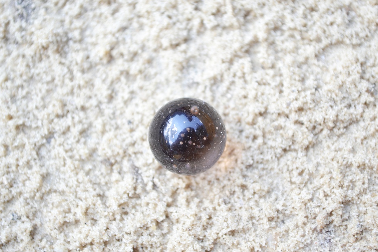 marbles  sand  white free photo