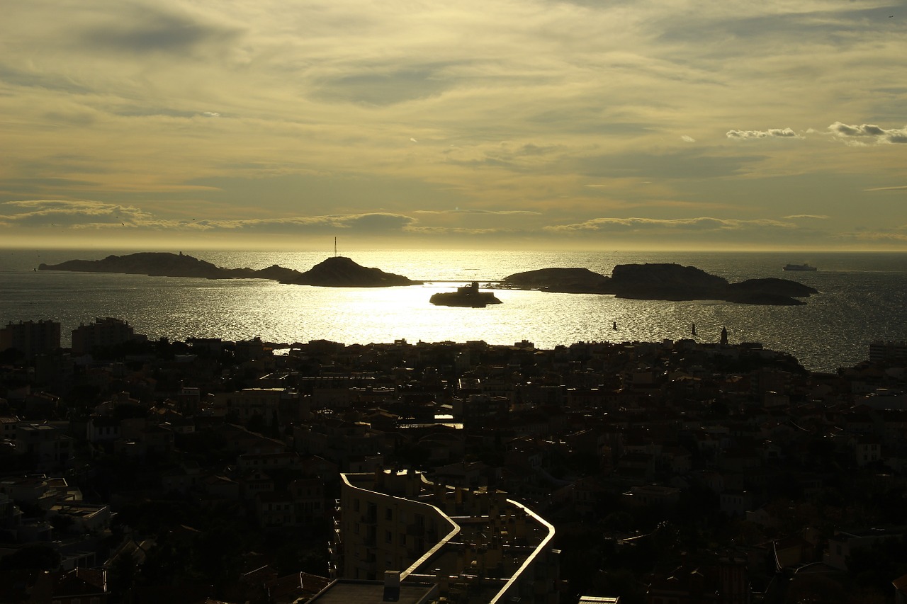 marseille sunset reflections on the water free photo