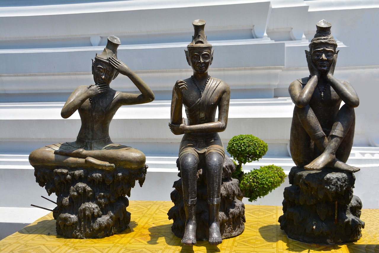 thai yoga statues spiritual practice sculpture poses for massage free photo