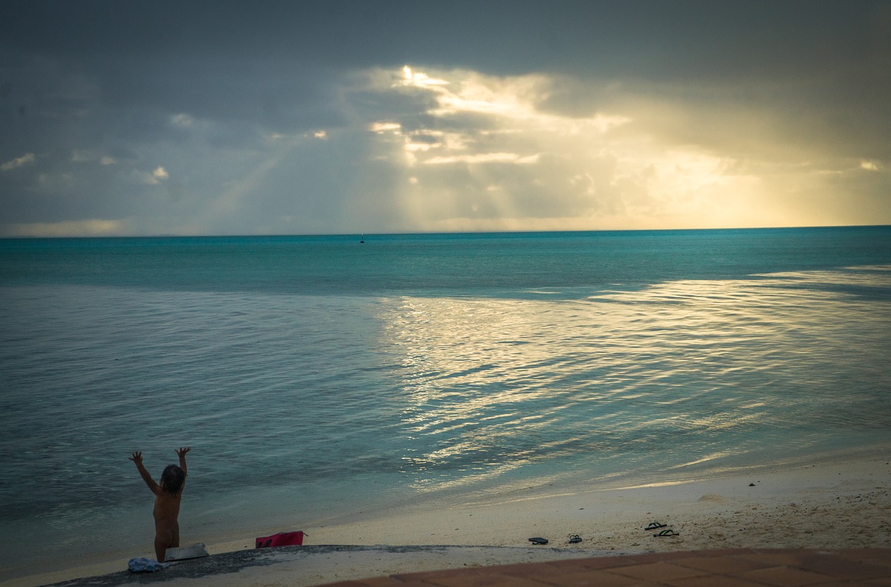 matira beach sun ray sunset free photo