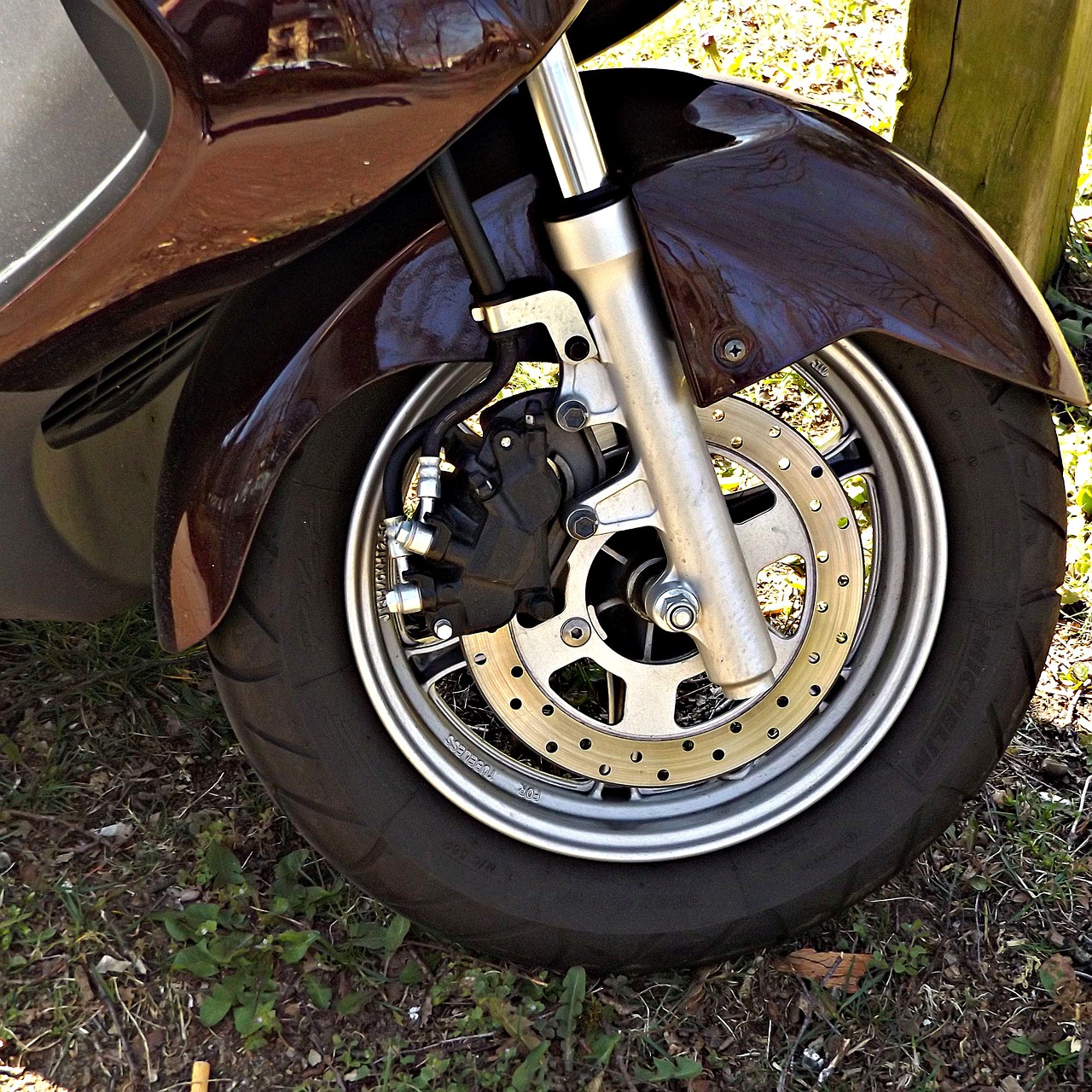 mature motor scooter brake free photo