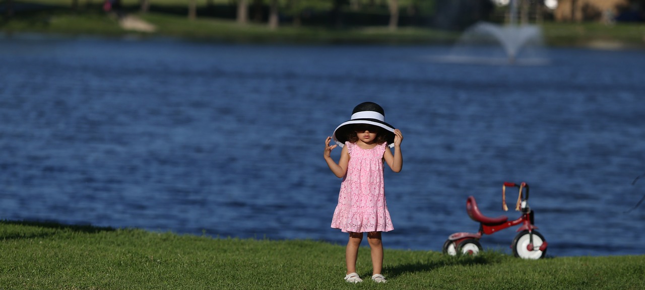 little girl hat bike free photo