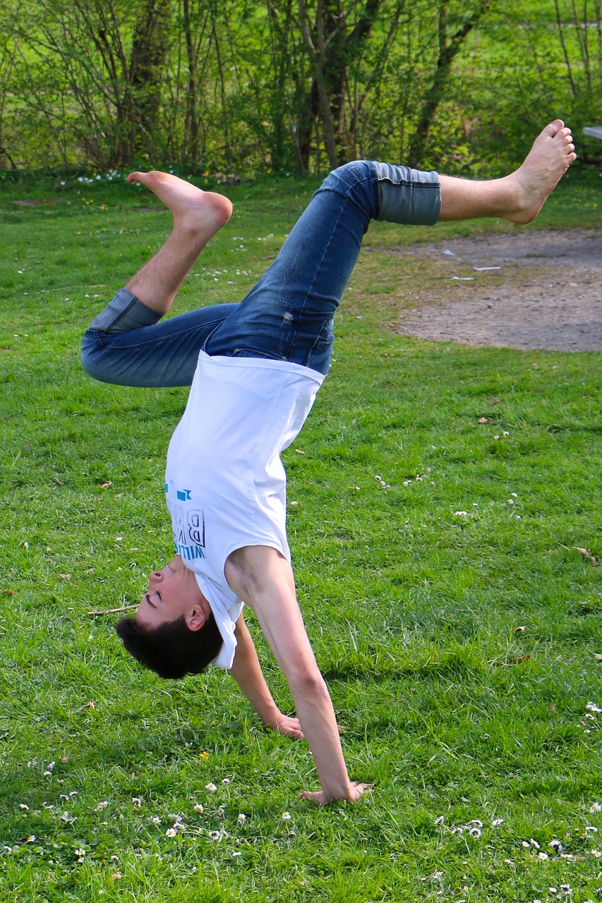 meadow acrobatics boy free photo