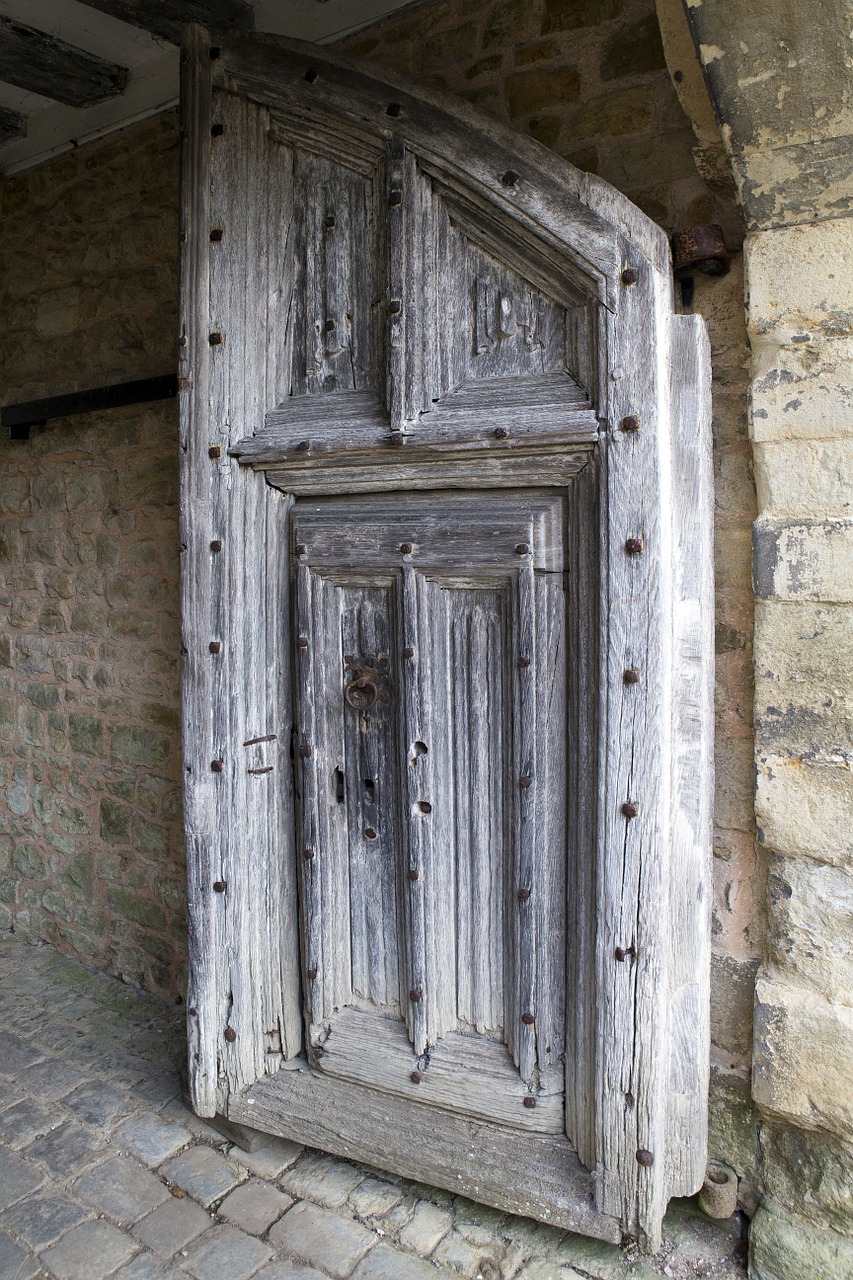 medieval oak door iron bolts judas gate free photo