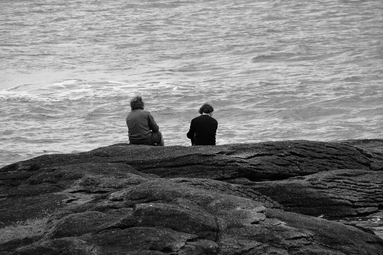 men rocks discussion free photo