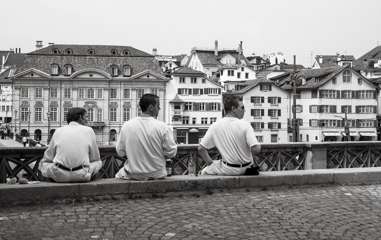 men sitting waiting free photo