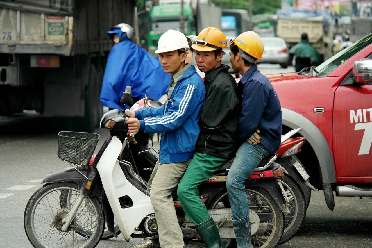 men on bike vietnam asia free photo