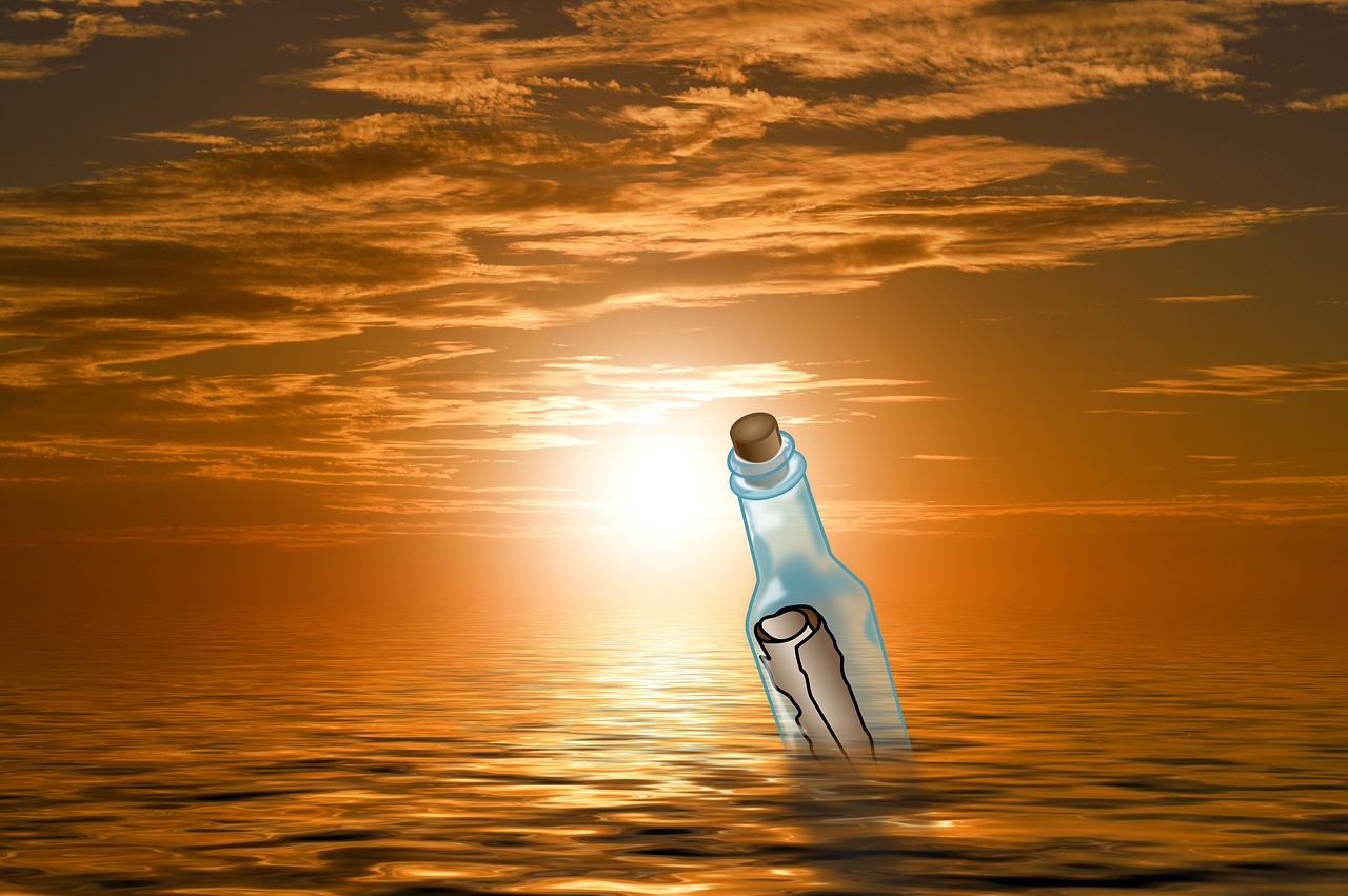 message in a bottle sun sea free photo