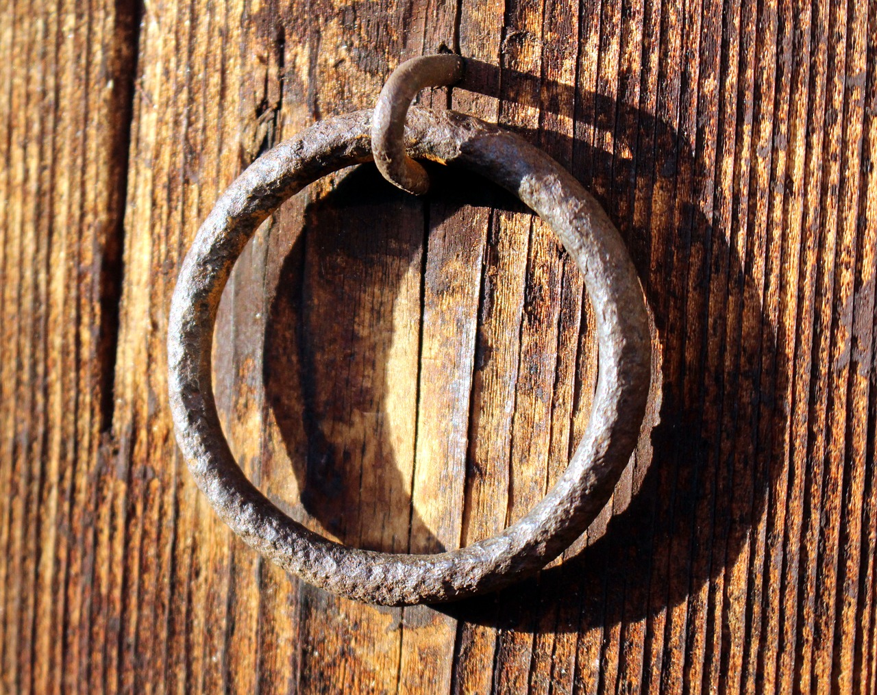 metal ring fitting wooden door free photo