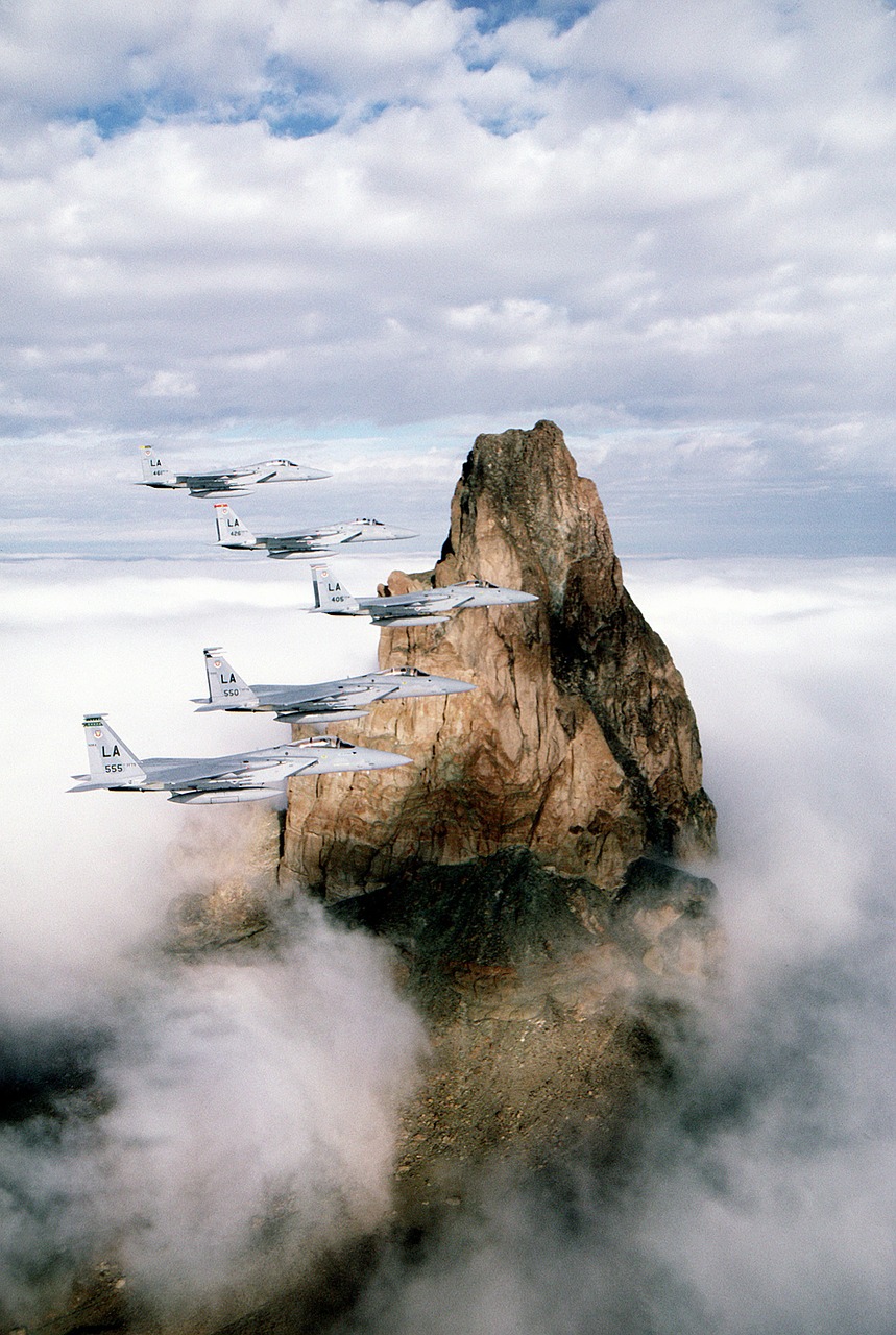military aircraft flying formation free photo