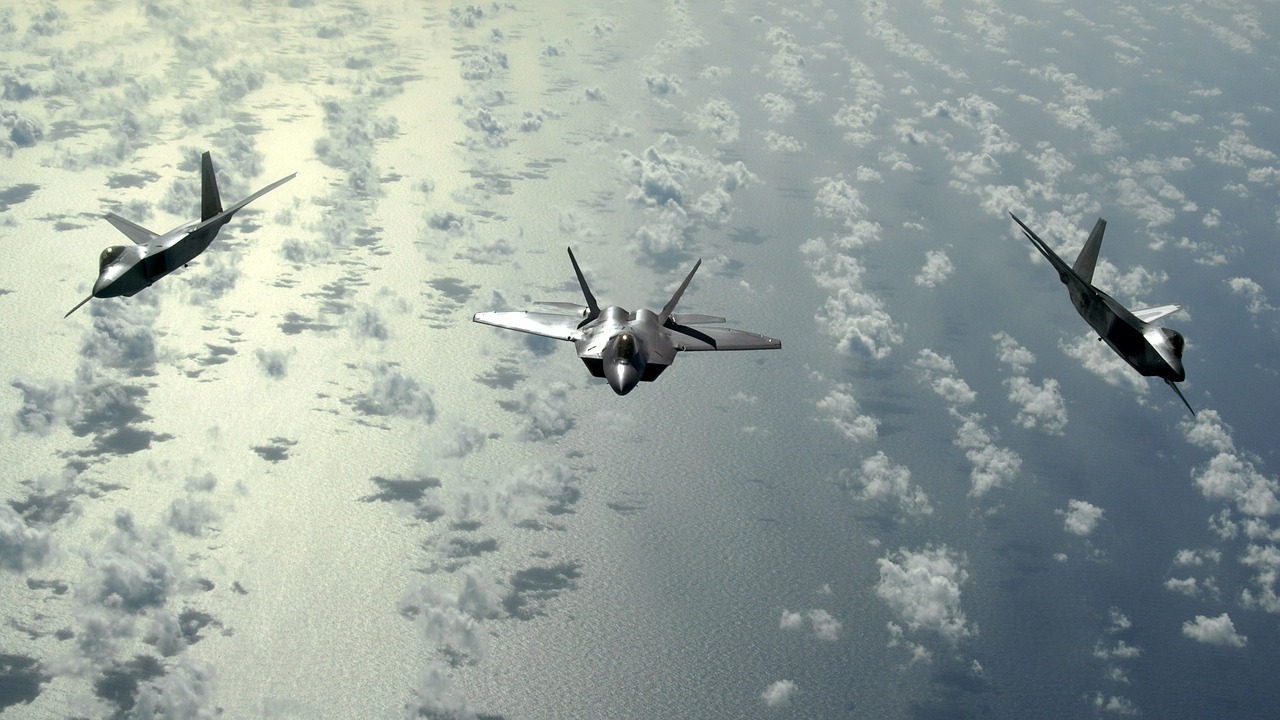 military aircraft formation f-22 free photo