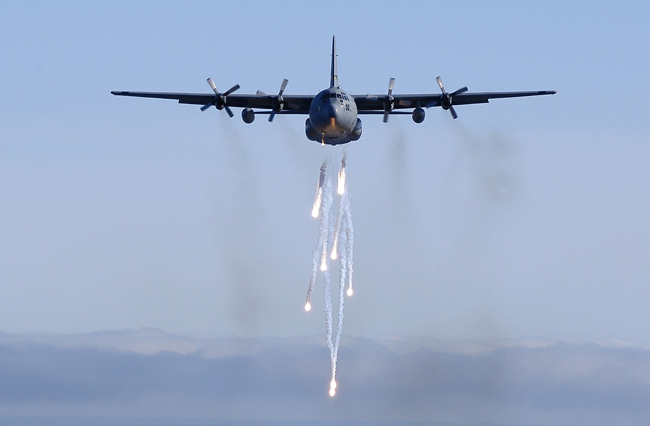 military aircraft flares drop free photo