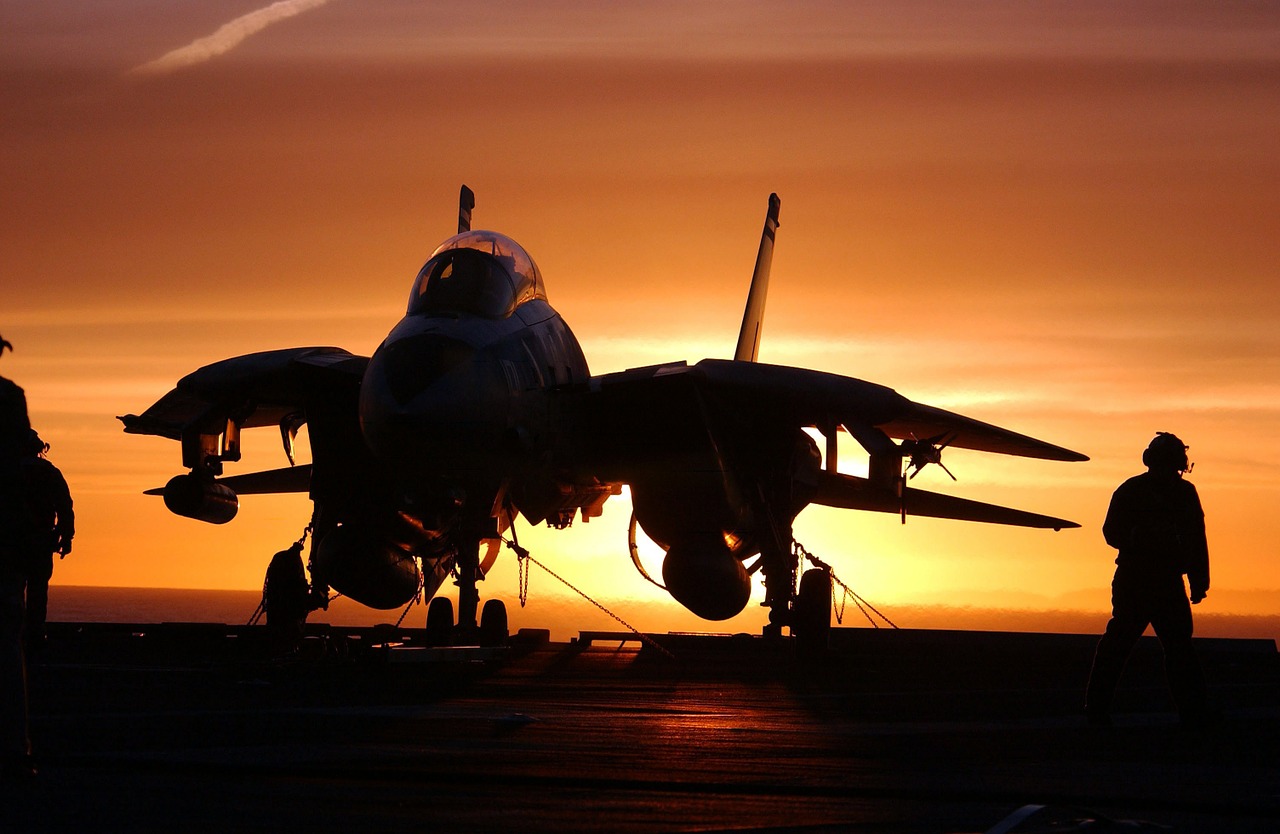 military jet fighter aircraft carrier sundown free photo