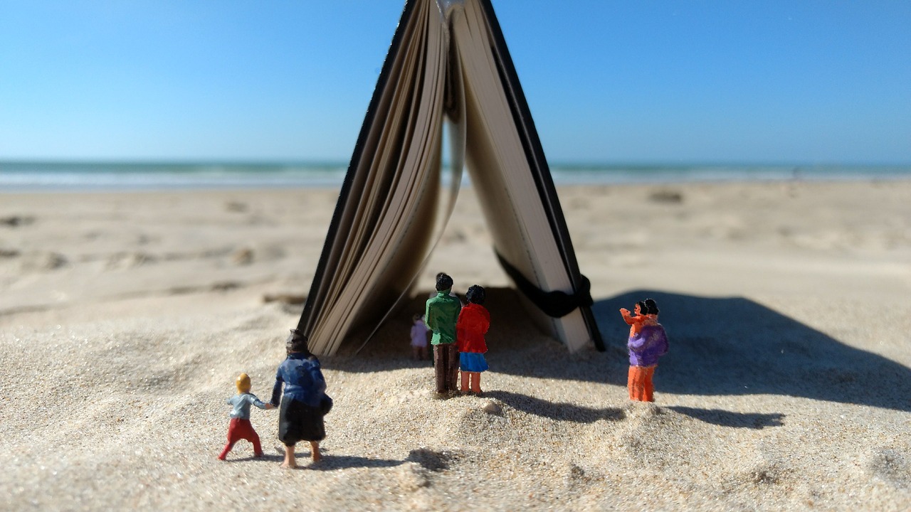 miniature figures beach notebook free photo