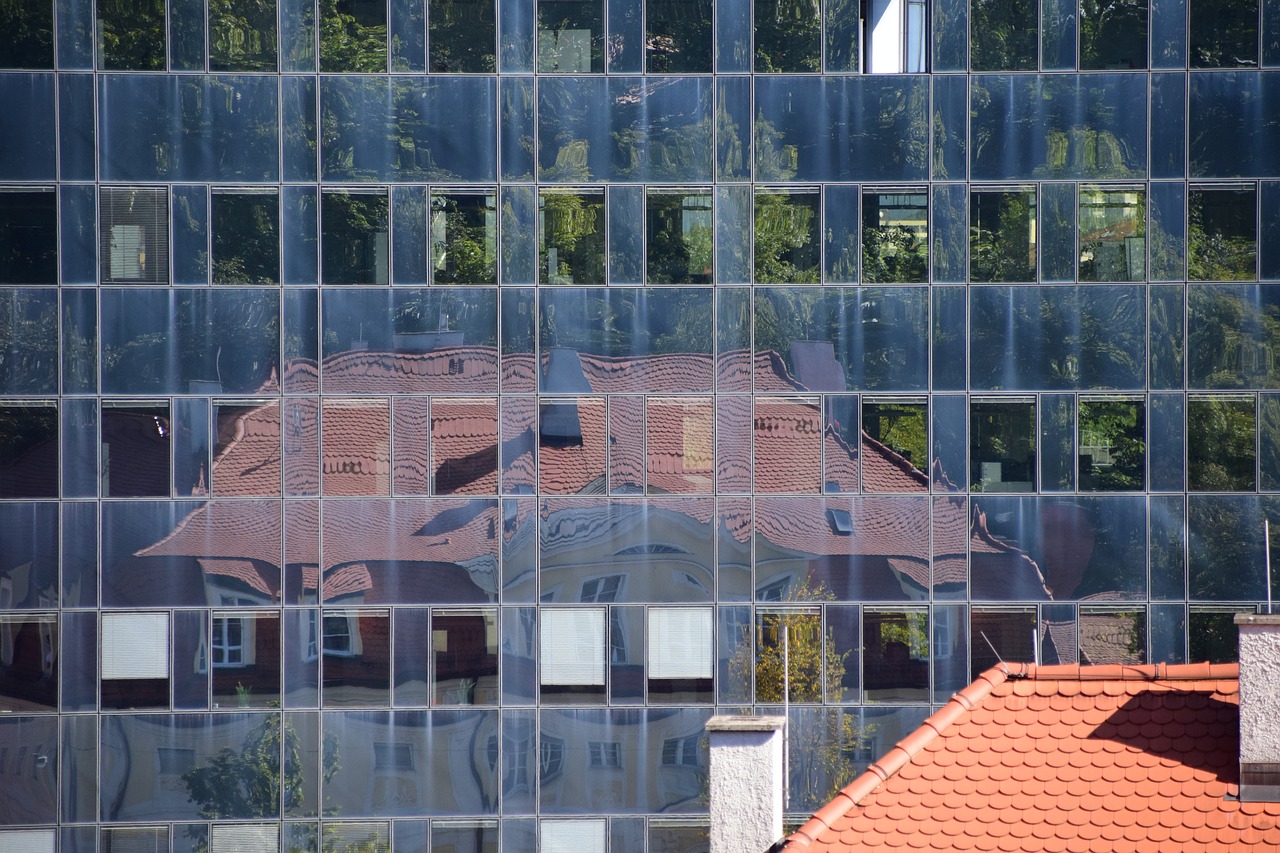 mirroring facade building free photo