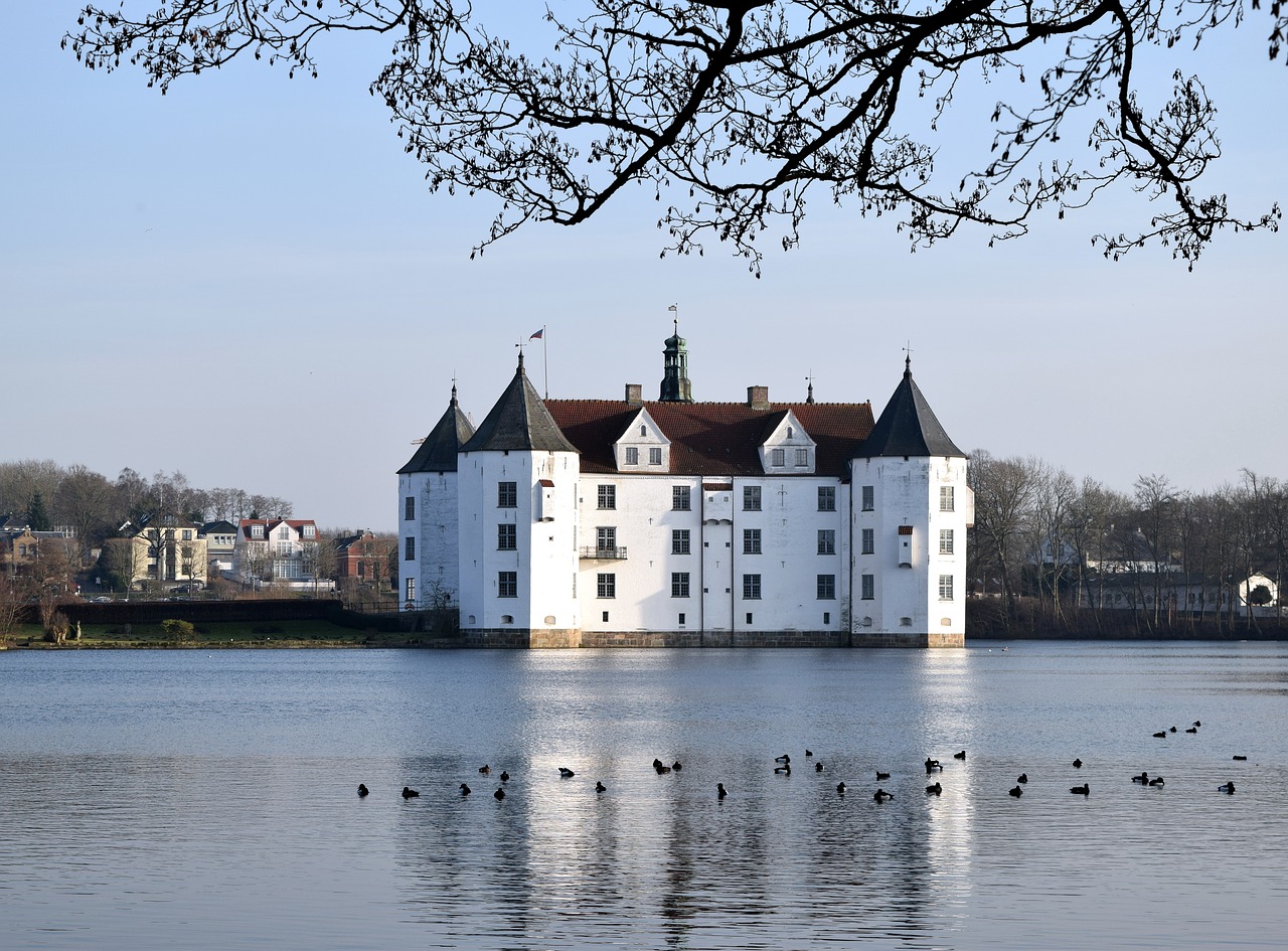 moated castle  glücksburg  lake free photo