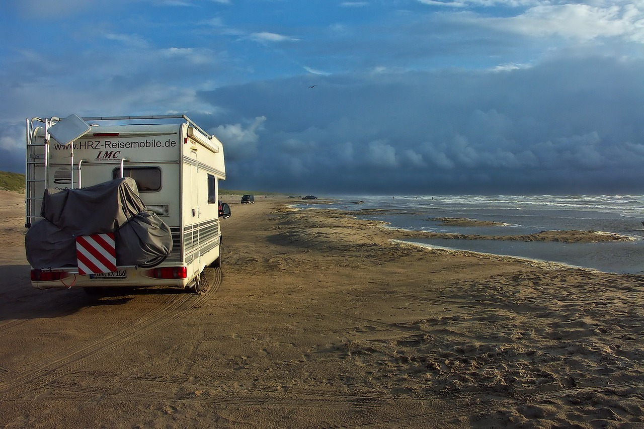 mobile home camper on the beach beach free photo