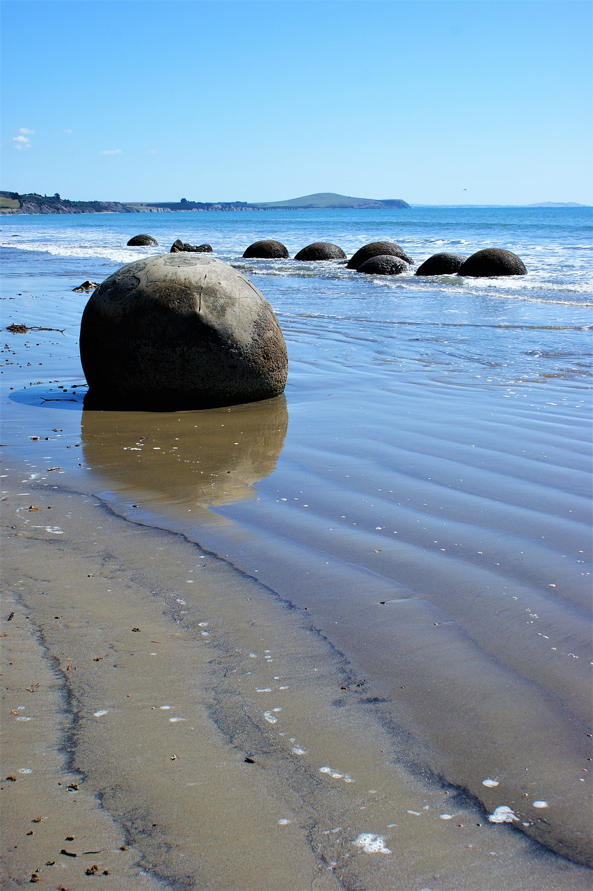 moeraki boulders new zealand beach free photo