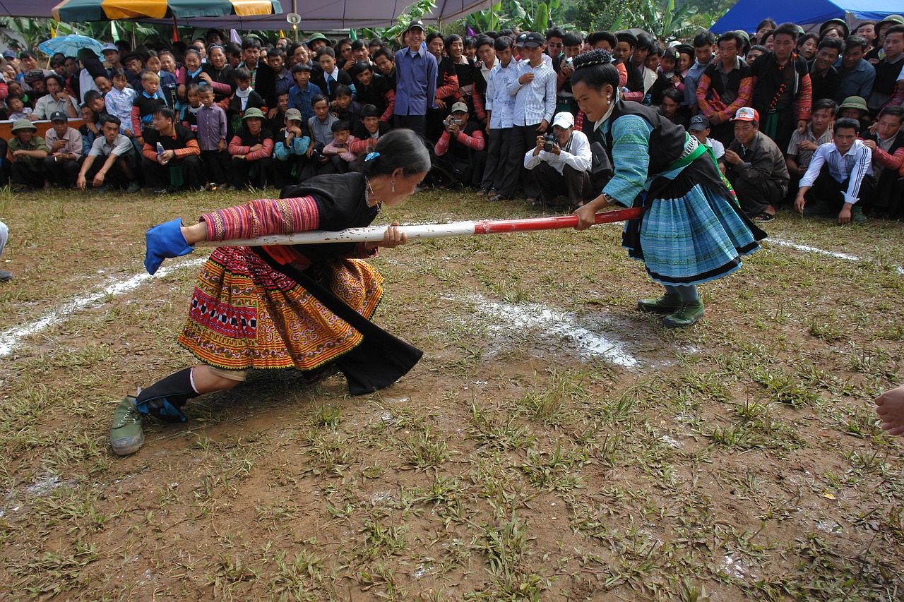 hmong girls playing tug village festival free photo