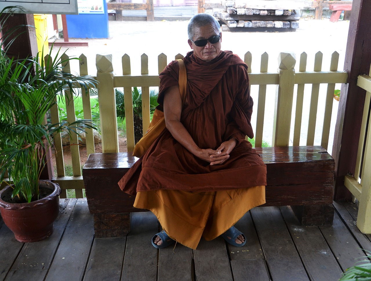 monk waiting shades free photo