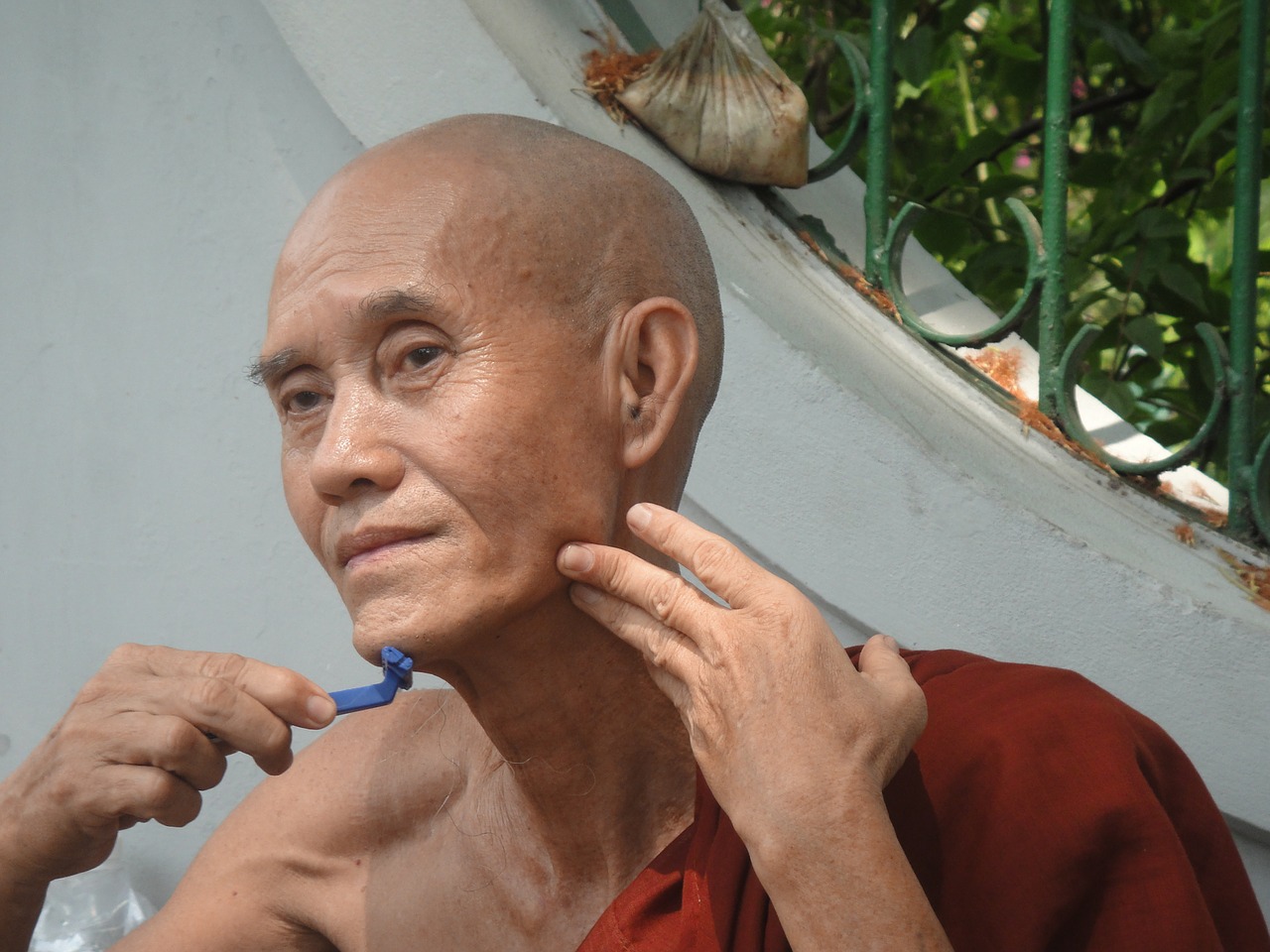 monk shaving myanmar free photo