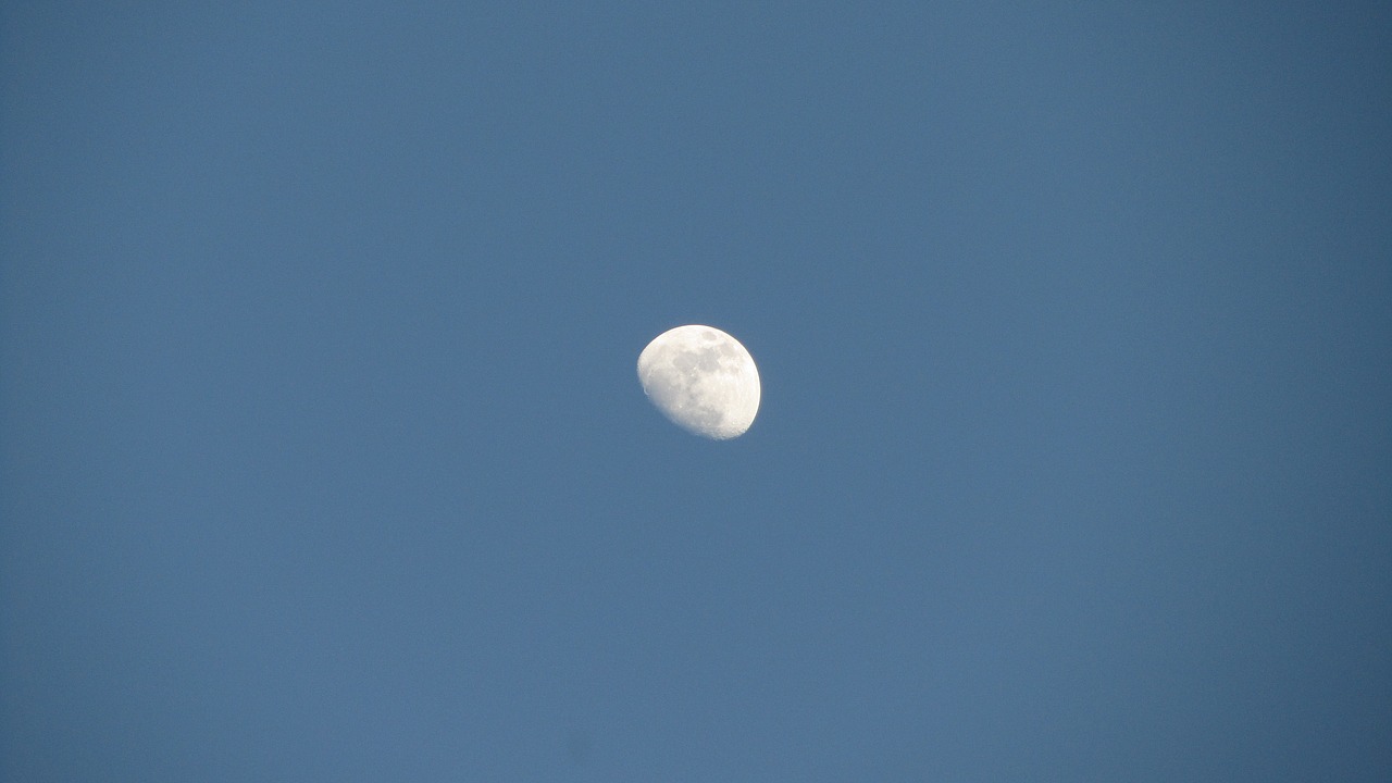 moon blue sky daytime free photo