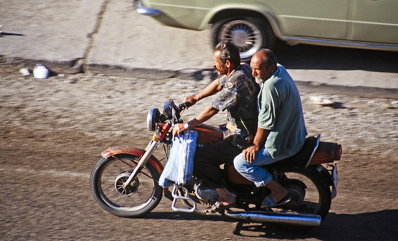 moped two wheeled vehicle men free photo