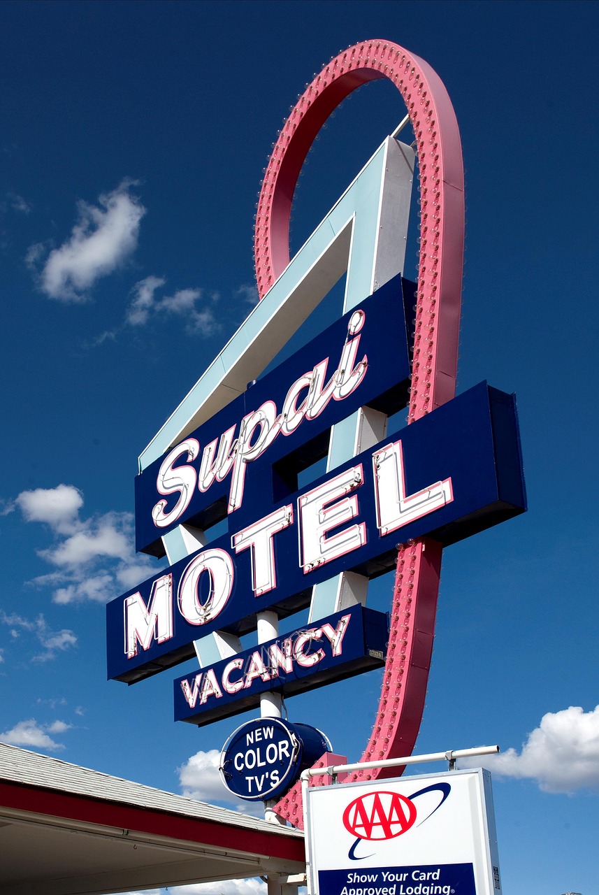 motel shield advertising sign free photo