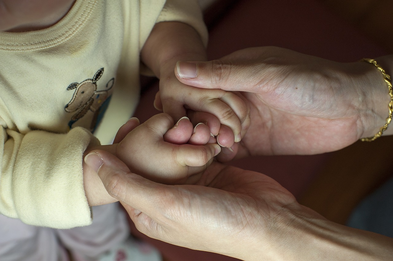 mother and son baby hand free photo