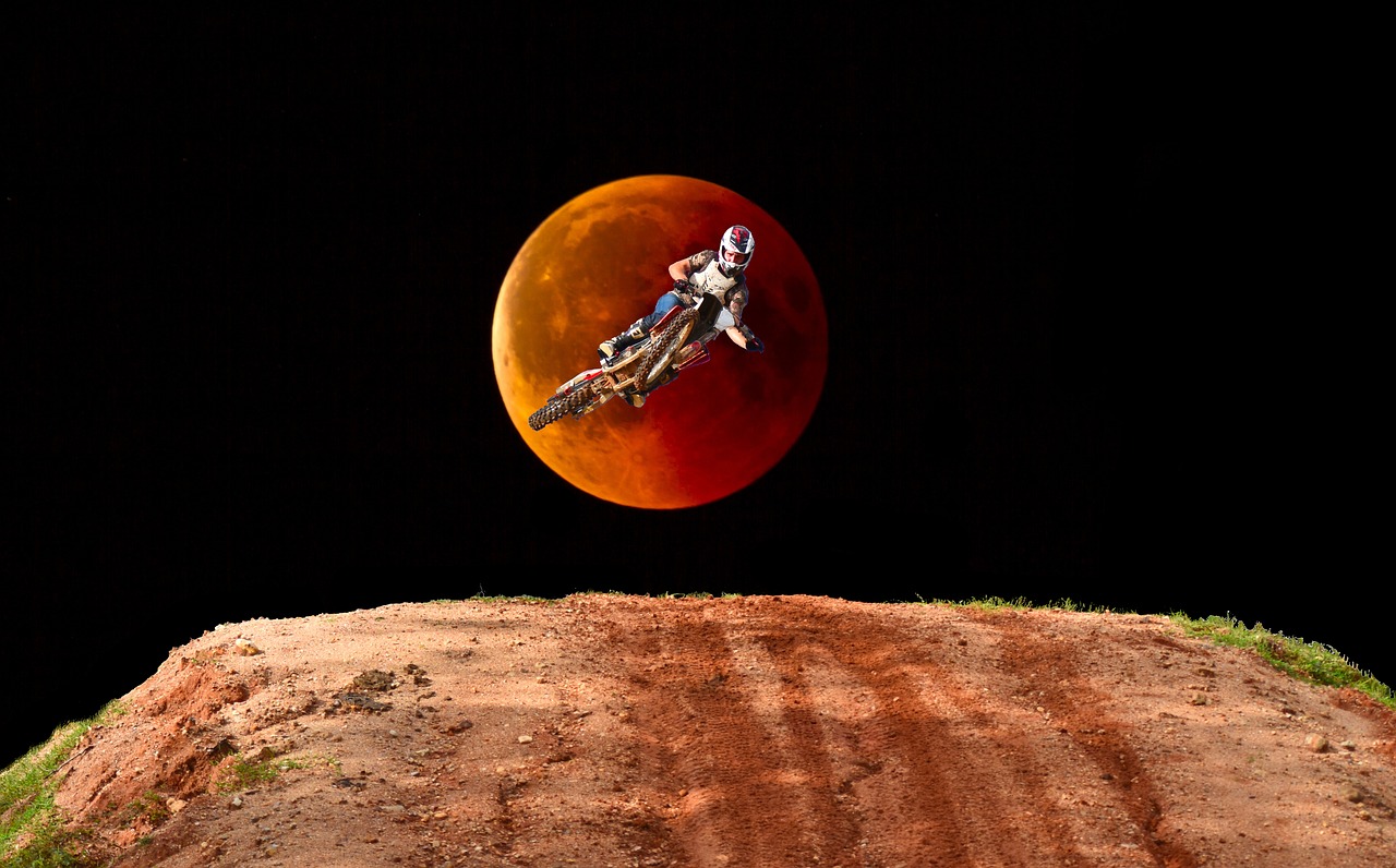 motocross  dirt bike  jump free photo