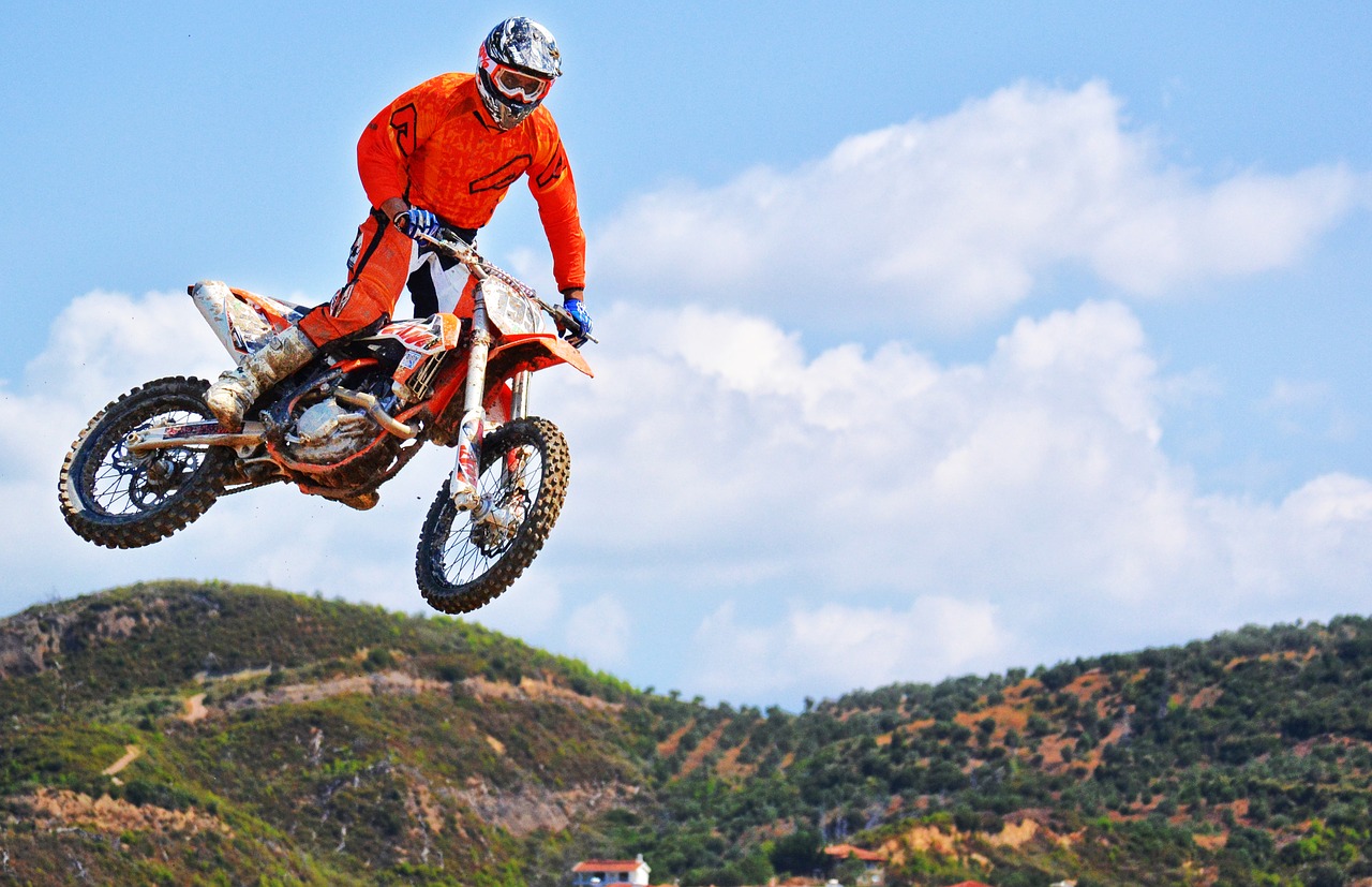 motocross rider jump dirt bike free photo
