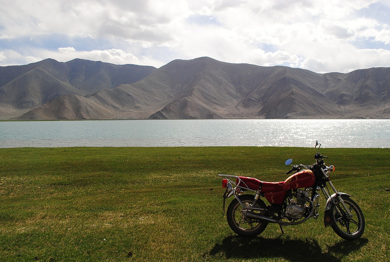 motorbike lake mountain free photo