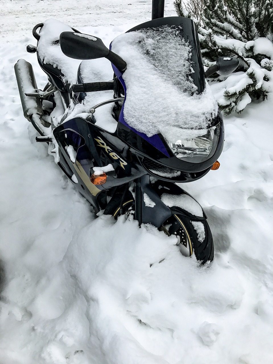 motorcycle snow snowdrifts free photo