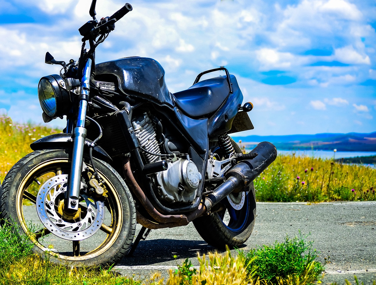 motorcycle  clouds  sky free photo