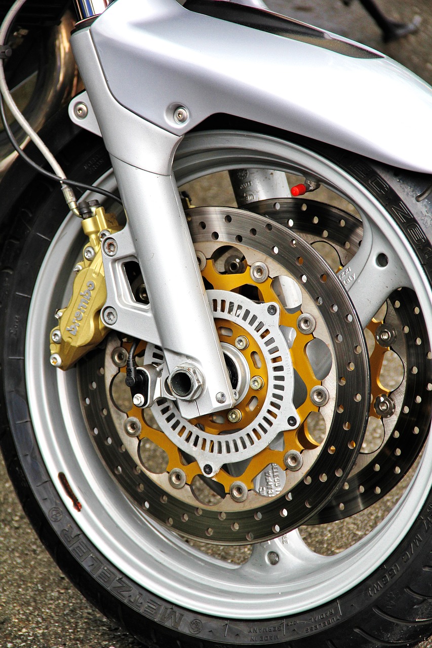 motorcycle  front wheel  two wheeled vehicle free photo