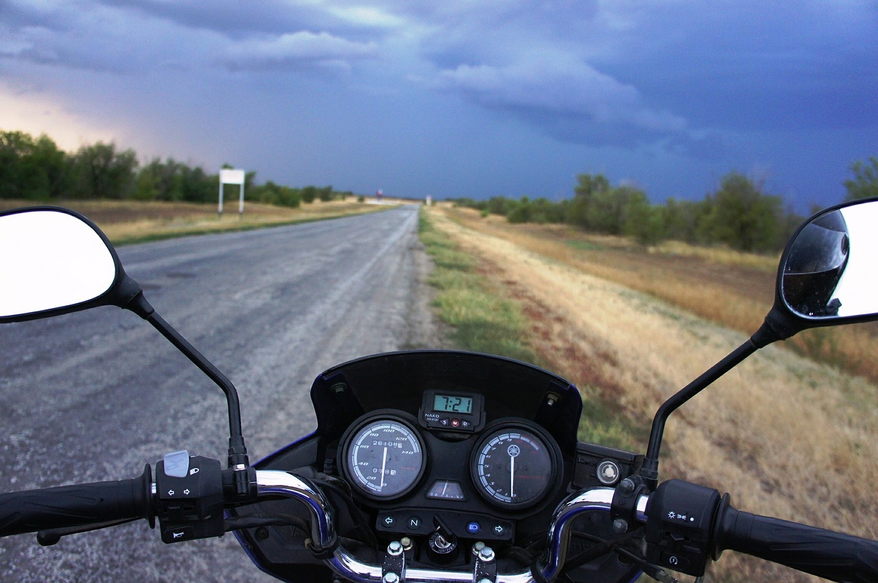 motorcycle road dark sky free photo