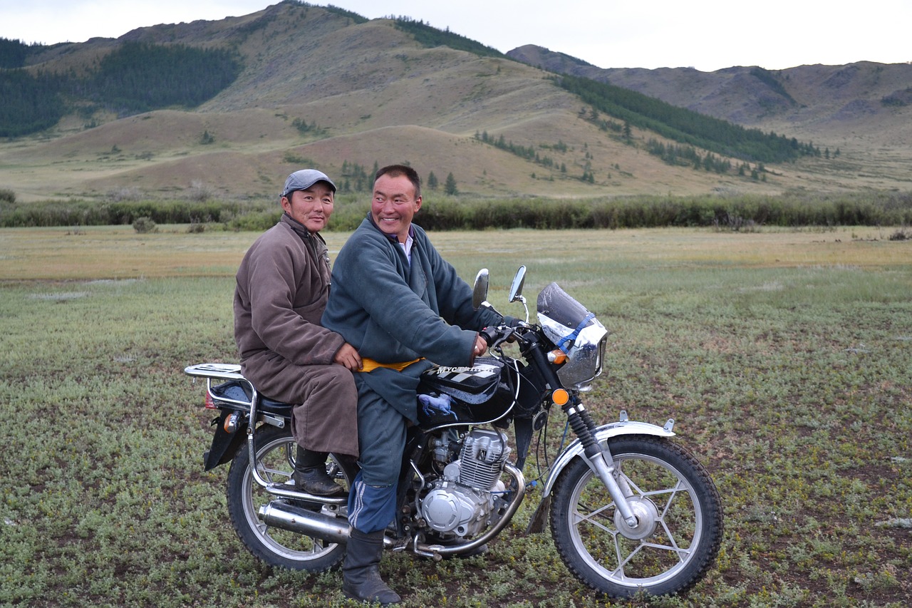 motorcyclist mongolia steppe free photo